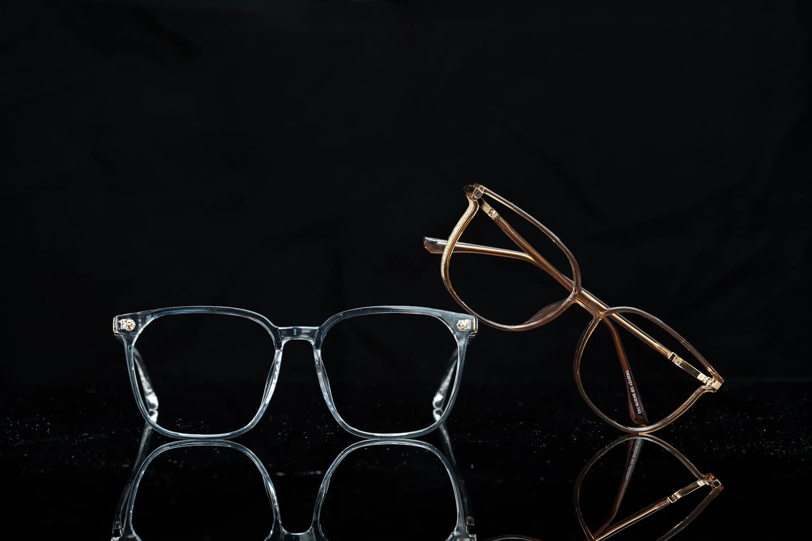 Independent luxury eyewear arranged for a Lindberg vs Jacques Marie Mage vs DITA comparison on a dark surface
